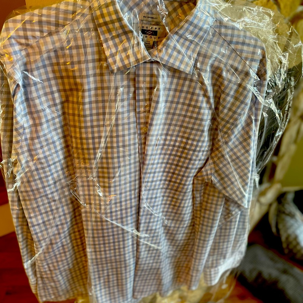 Freshly dry cleaned worn once button down dress shirt